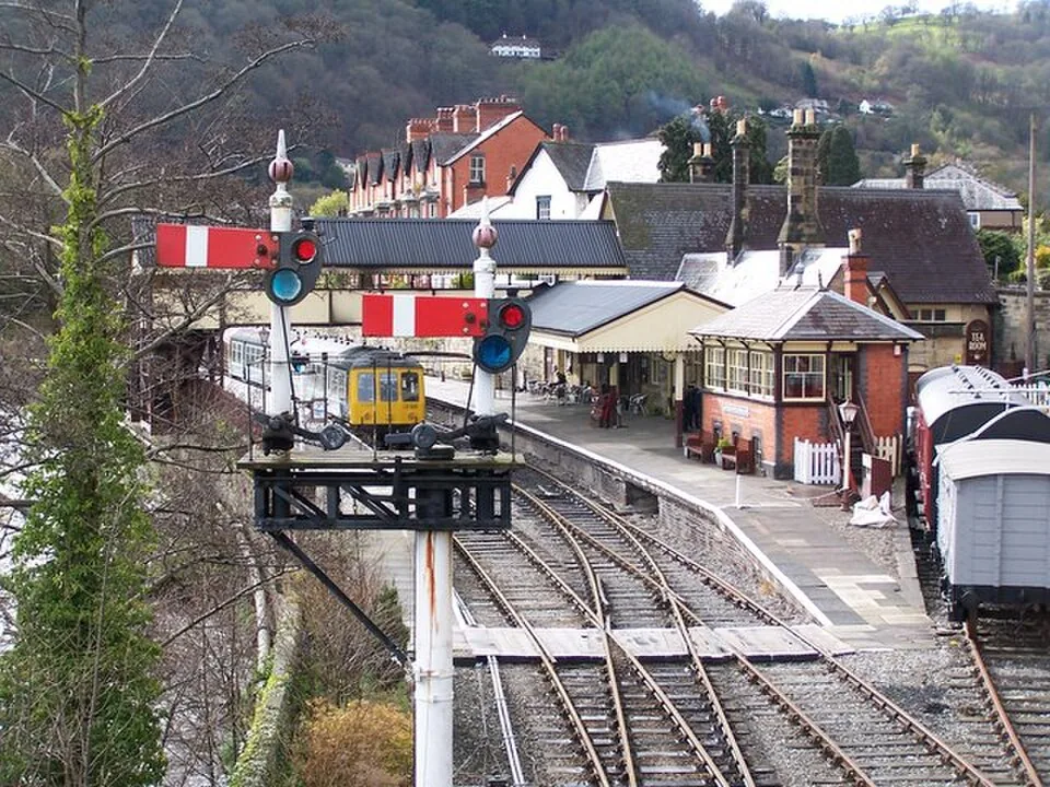 Llangollen → Berwyn → Carrog → Corwen: Llangollen Station with train seen through signals